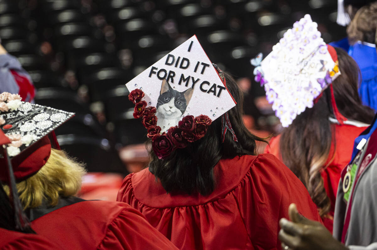 A decorated mortarboard cap is seen during a UNLV commencement ceremony at the Thomas & Mac ...