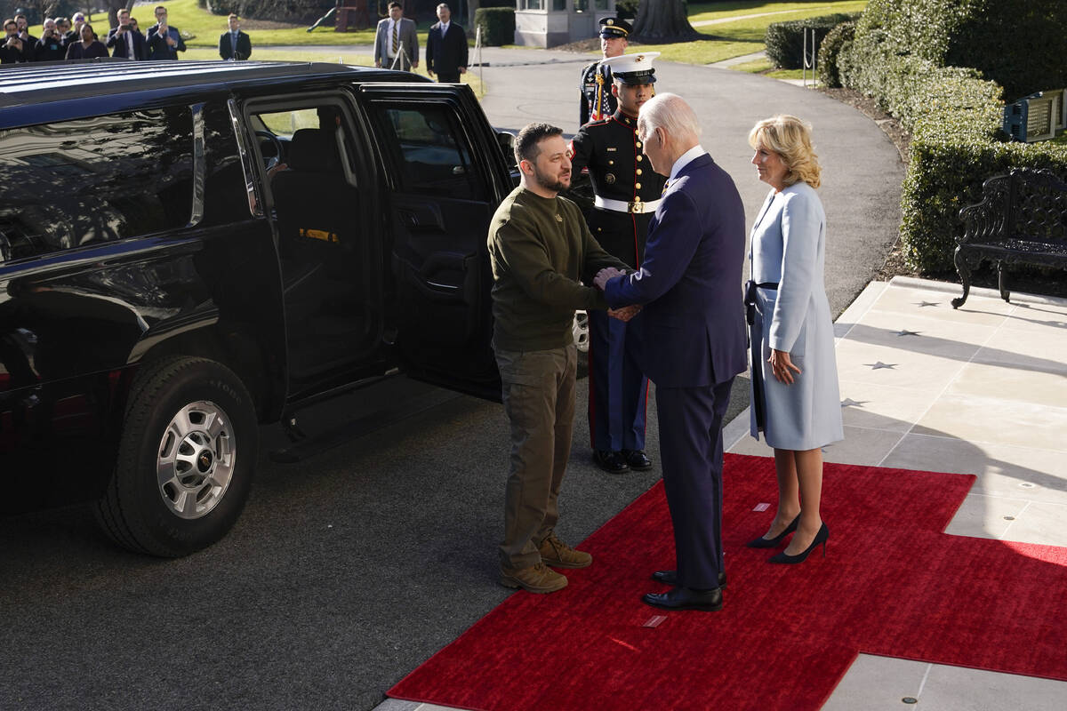 President Joe Biden shakes hands with Ukrainian President Volodymyr Zelenskyy as he welcomes hi ...