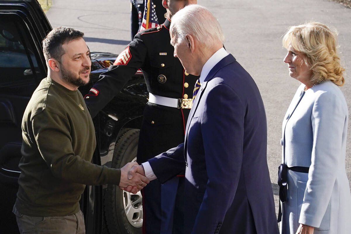 President Joe Biden shakes hands with Ukrainian President Volodymyr Zelenskyy as he welcomes hi ...