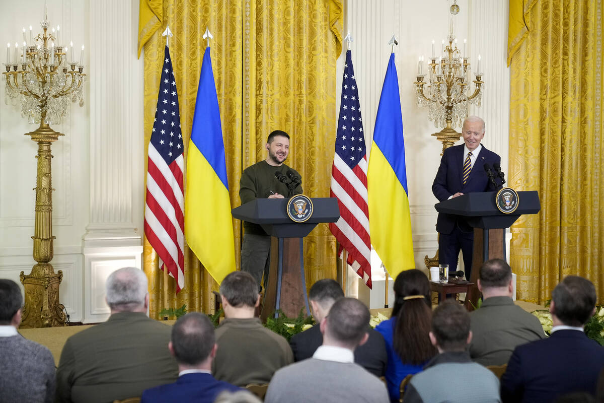 President Joe Biden and Ukrainian President Volodymyr Zelenskyy respond to questions from repor ...