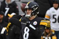 Pittsburgh Steelers quarterback Kenny Pickett (8) warms up before an NFL football game against ...