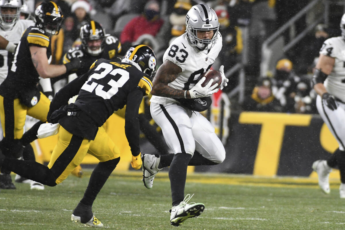 Las Vegas Raiders tight end Darren Waller (83) catches a pass with Pittsburgh Steelers safety D ...