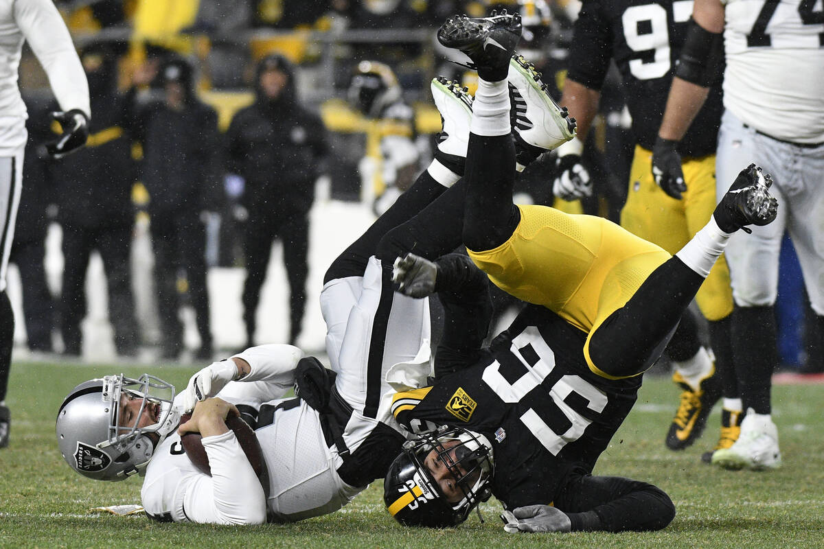 Pittsburgh Steelers linebacker Alex Highsmith (56) sacks Las Vegas Raiders quarterback Derek Ca ...