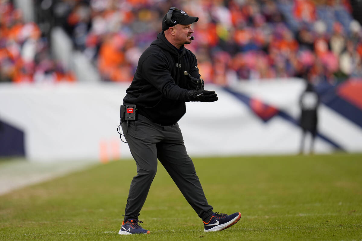 Denver Broncos head coach Nathaniel Hackett reacts after an interception against the Arizona Ca ...