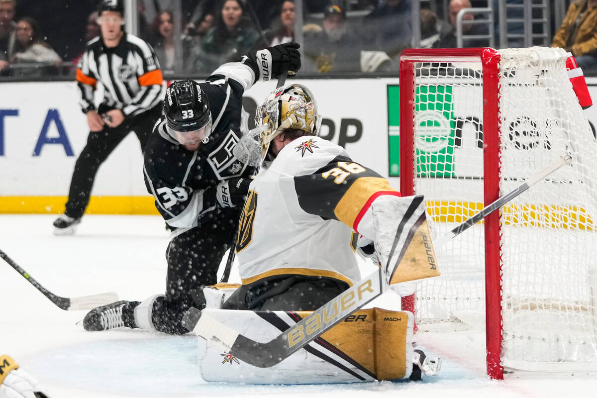 Vegas Golden Knights goaltender Logan Thompson (36) stops a shot by Los Angeles Kings' Viktor A ...