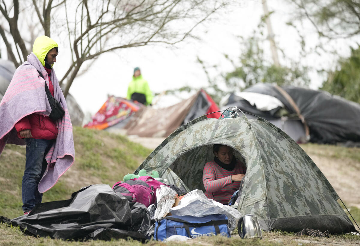 ]Migrants from Venezuela prepare for relocation to a refugee shelter in Matamoros, Mexico, on F ...