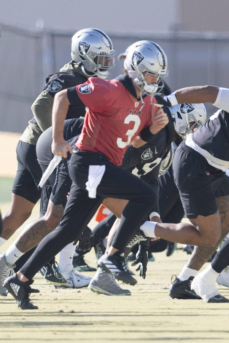 Raiders quarterback Jarrett Stidham (3) runs during practice at the Intermountain Healthcare Pe ...