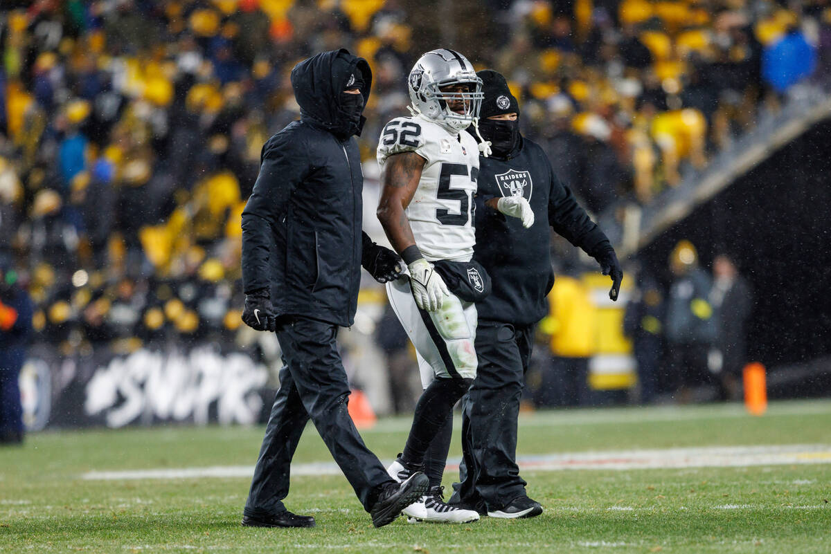 Las Vegas Raiders linebacker Denzel Perryman (52) walks off the field after being injured durin ...