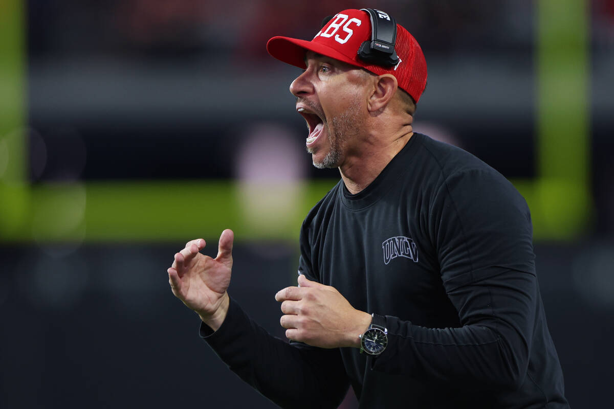 UNLV Rebels head coach Marcus Arroyo yells from the sidelines during a play in the second half ...