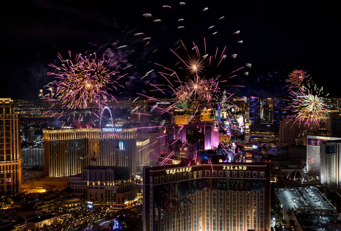 Fireworks explode over the Las Vegas Strip during New Year’s Eve celebrations on Saturday, Ja ...