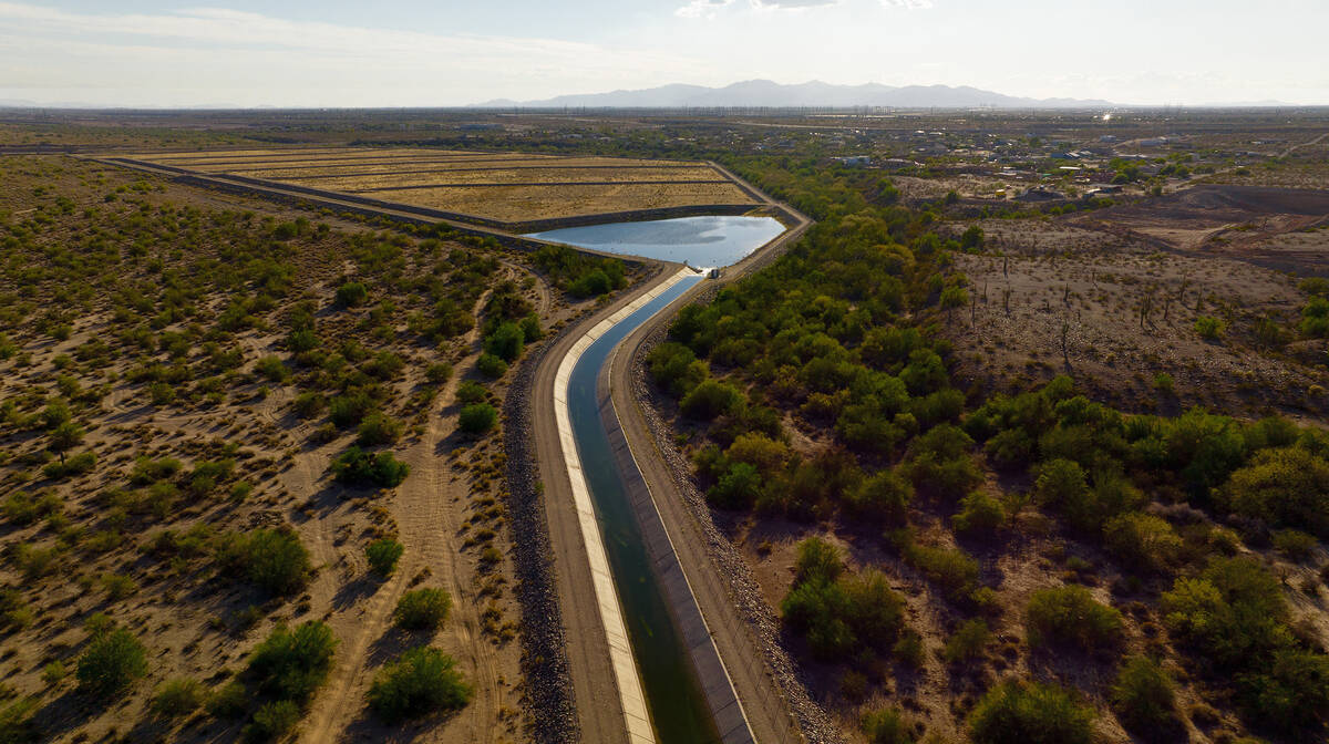 Colorado River water flows into the Agua Fria groundwater recharge basins (or groundwater recha ...