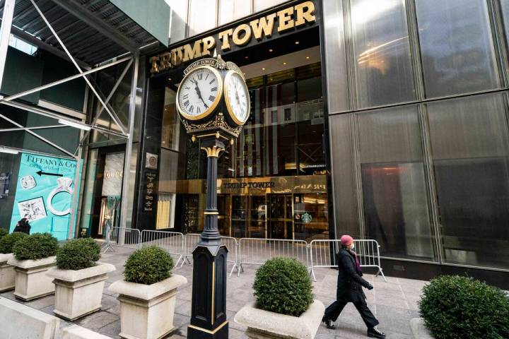 FILE — A pedestrian passes security barricades in front of Trump Tower, Feb. 17, 2021, i ...