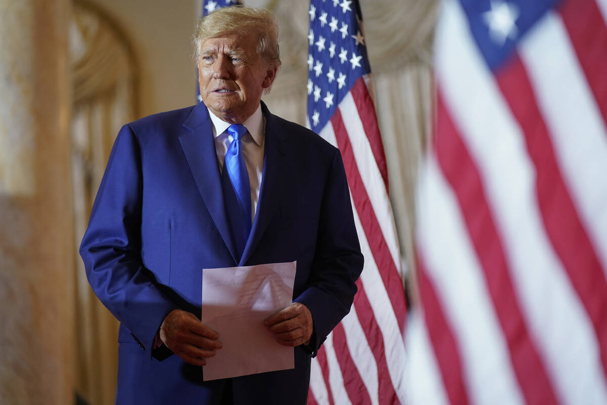 FILE - Former President Donald Trump arrives to speak at Mar-a-lago on Election Day, Nov. 8, 20 ...