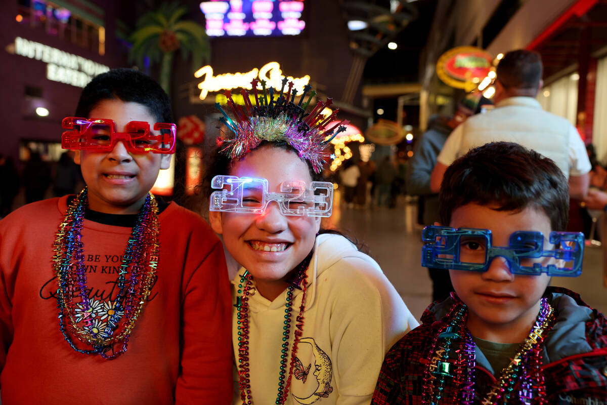 Nathan Zamora, 5, from left, Sophia Mendoza, 11, and Nathan Zamora, 5, of Seattle celebrate on ...