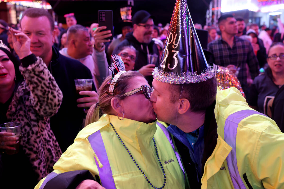 Ryan and Valerie Hildreth of Portland, Maine, celebrate on New Year’s Eve at the Fremont Stre ...