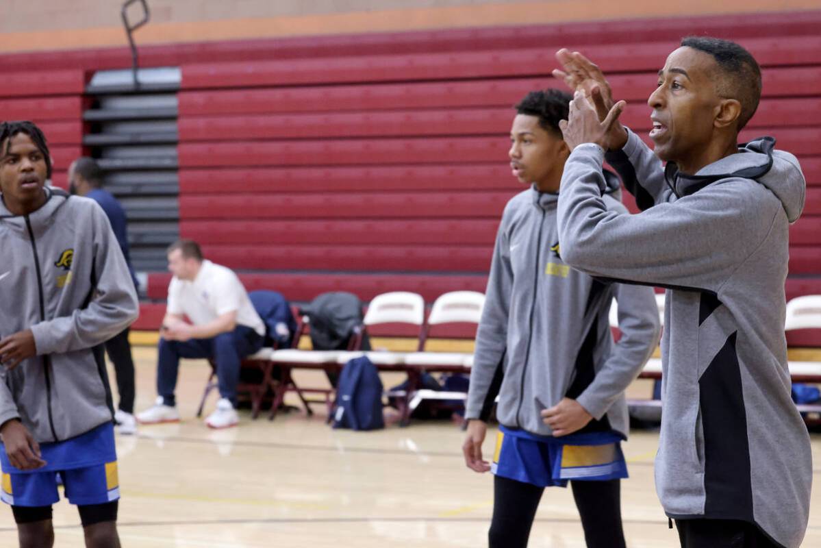 Democracy Prep assistant coach Mark Coleman instructs players before a game against Anchorage C ...