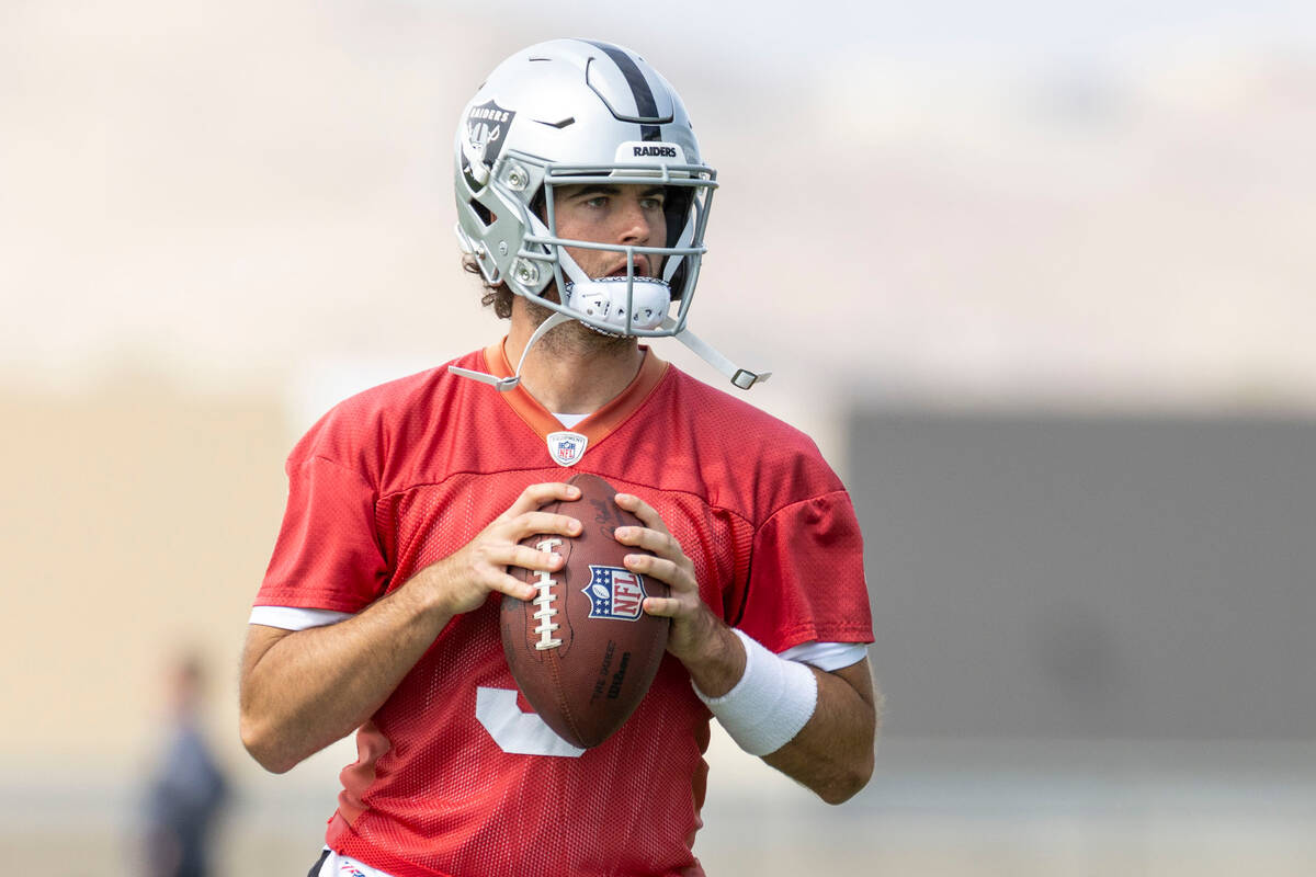 Raiders quarterback Jarrett Stidham (9) prepares to throw during practice at the Intermountain ...