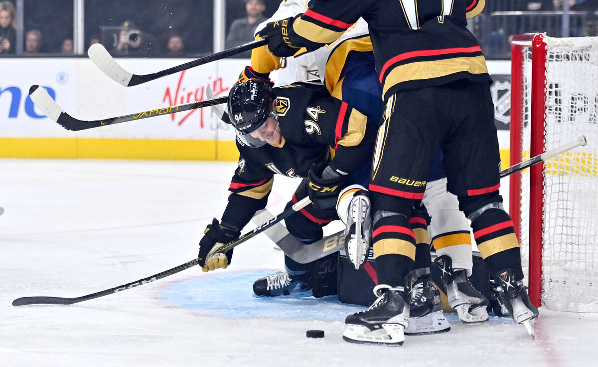 Vegas Golden Knights defenseman Brayden Pachal (94) defends the goal against the Nashville Pred ...