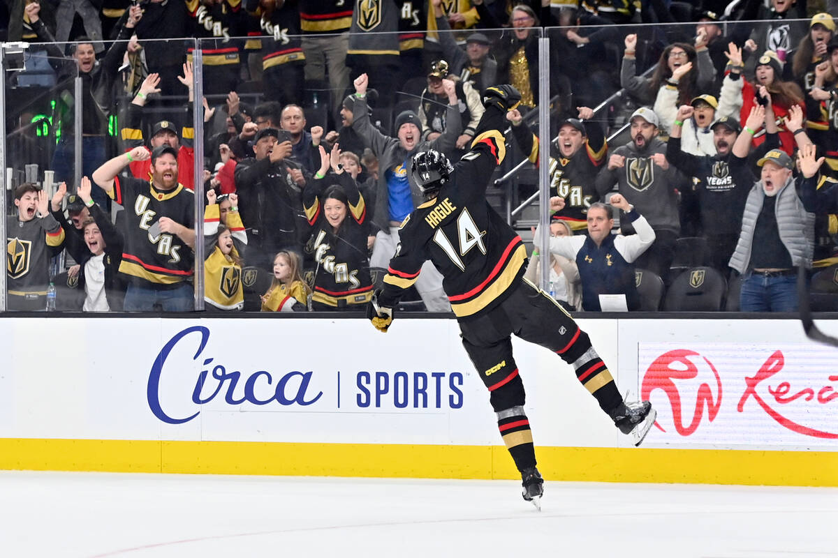 Vegas Golden Knights defenseman Nicolas Hague (14) reacts after scoring the winning goal during ...