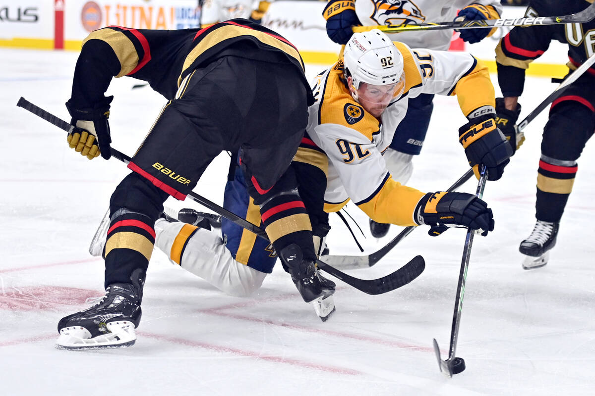 Nashville Predators center Ryan Johansen (92) battles for the puck after a face-off against the ...