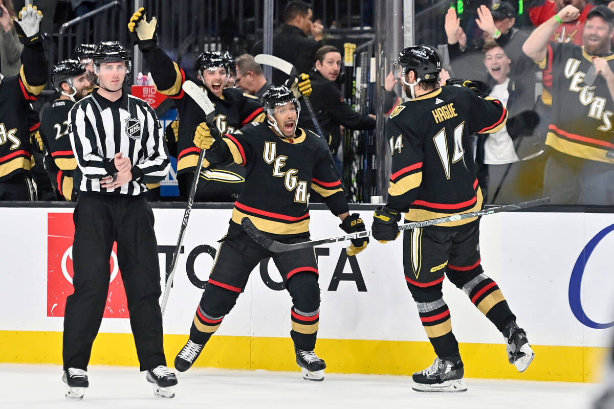 Vegas Golden Knights right wing Keegan Kolesar (55) and defenseman Nicolas Hague (14) react aft ...