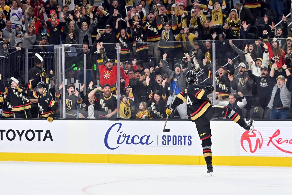 Vegas Golden Knights defenseman Nicolas Hague (14) reacts after scoring the winning goal during ...