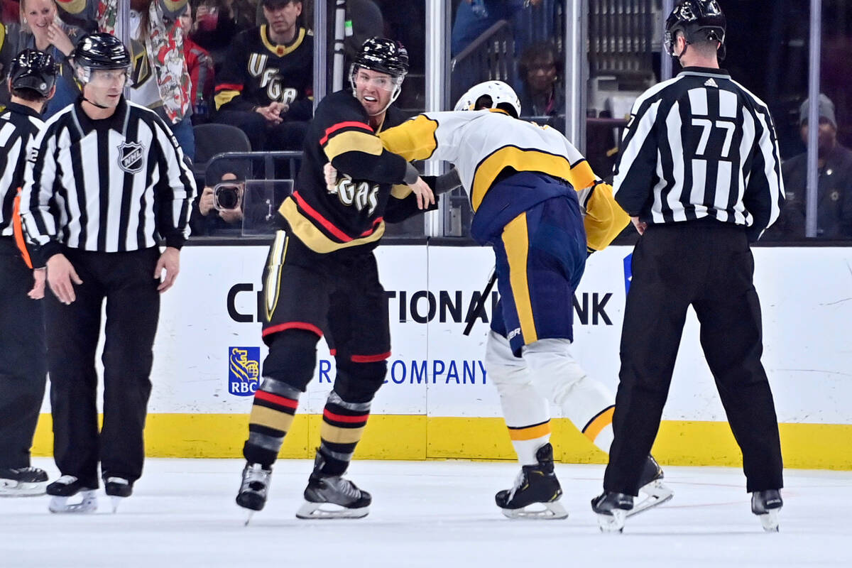 Vegas Golden Knights defenseman Brayden McNabb, center left, and Nashville Predators center Yak ...