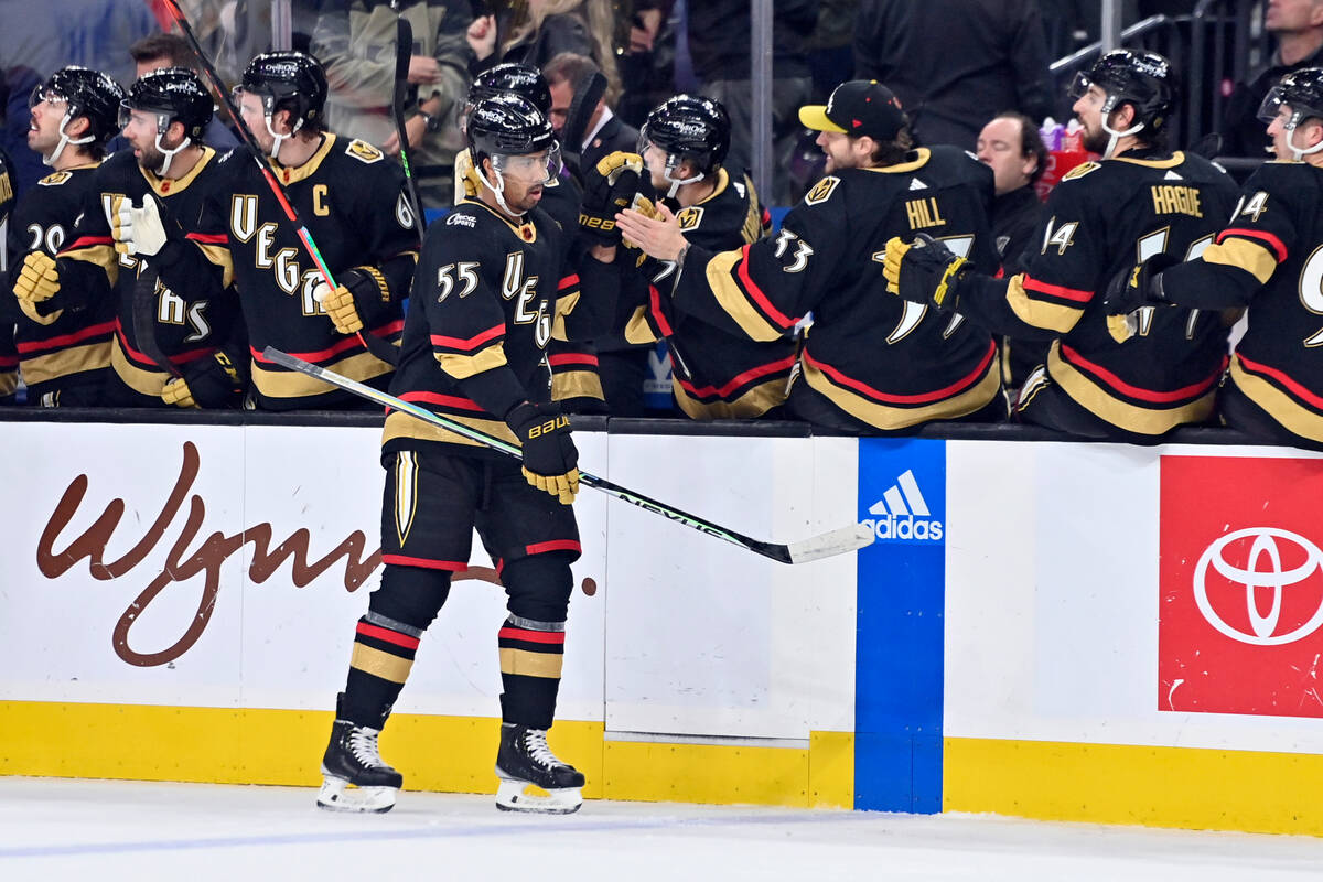 Vegas Golden Knights right wing Keegan Kolesar (55) celebrates at the bench after scoring a goa ...