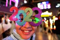 Mia Preciado 8, of Mexico celebrates on New Year’s Eve at the Fremont Street Experience in do ...