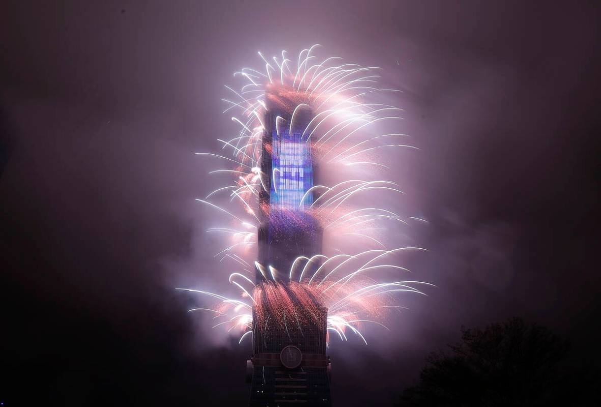 A firework display explodes off Taiwan's tallest skyscraper Taipei101 to usher in the New Year ...