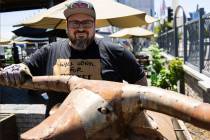 Bruce Kalman, chef and owner of Soulbelly BBQ, Arts District BBQ spot, poses for a photo at his ...