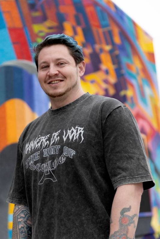 Brandon Bowsky, who had a large mural painted on two sides of his house, in front of the art pi ...
