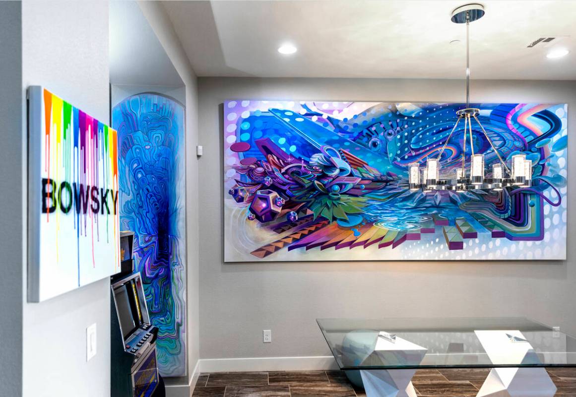 Various art pieces on the interior walls of Marketing CEO Brandon Bowsky's home which he had a ...