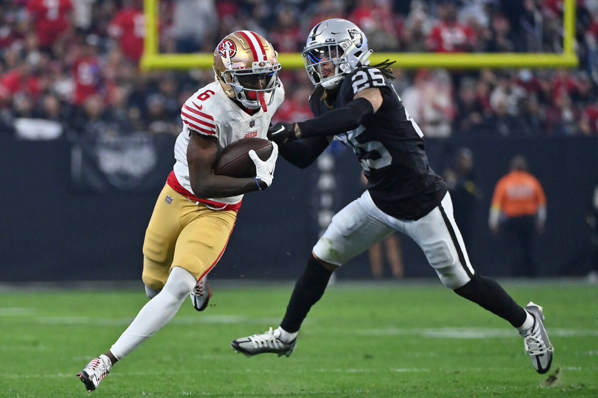 San Francisco 49ers wide receiver Danny Gray (6) is pursued by Las Vegas Raiders safety Tre'von ...