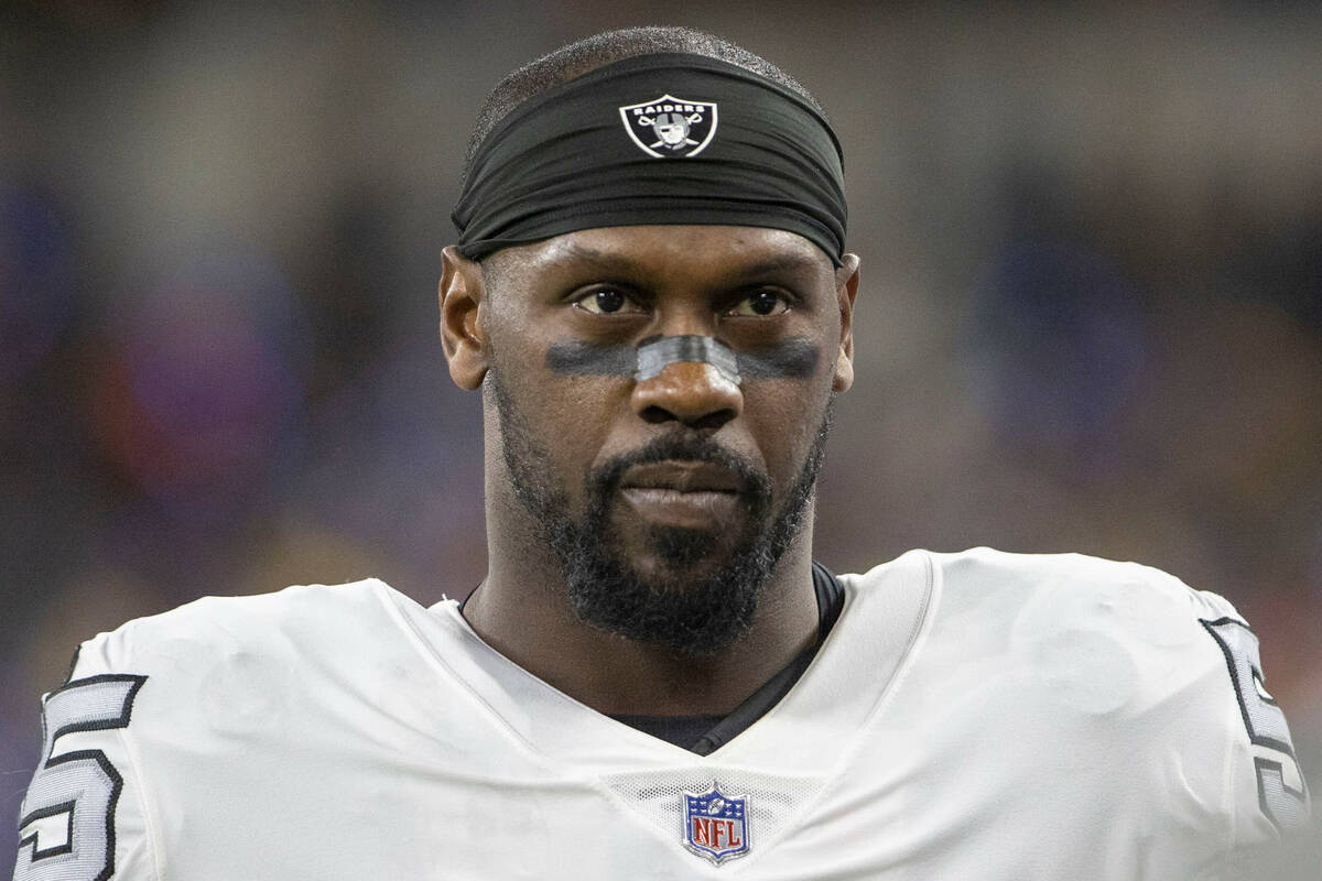 Raiders defensive end Chandler Jones (55) waits on the sideline before an NFL game against the ...