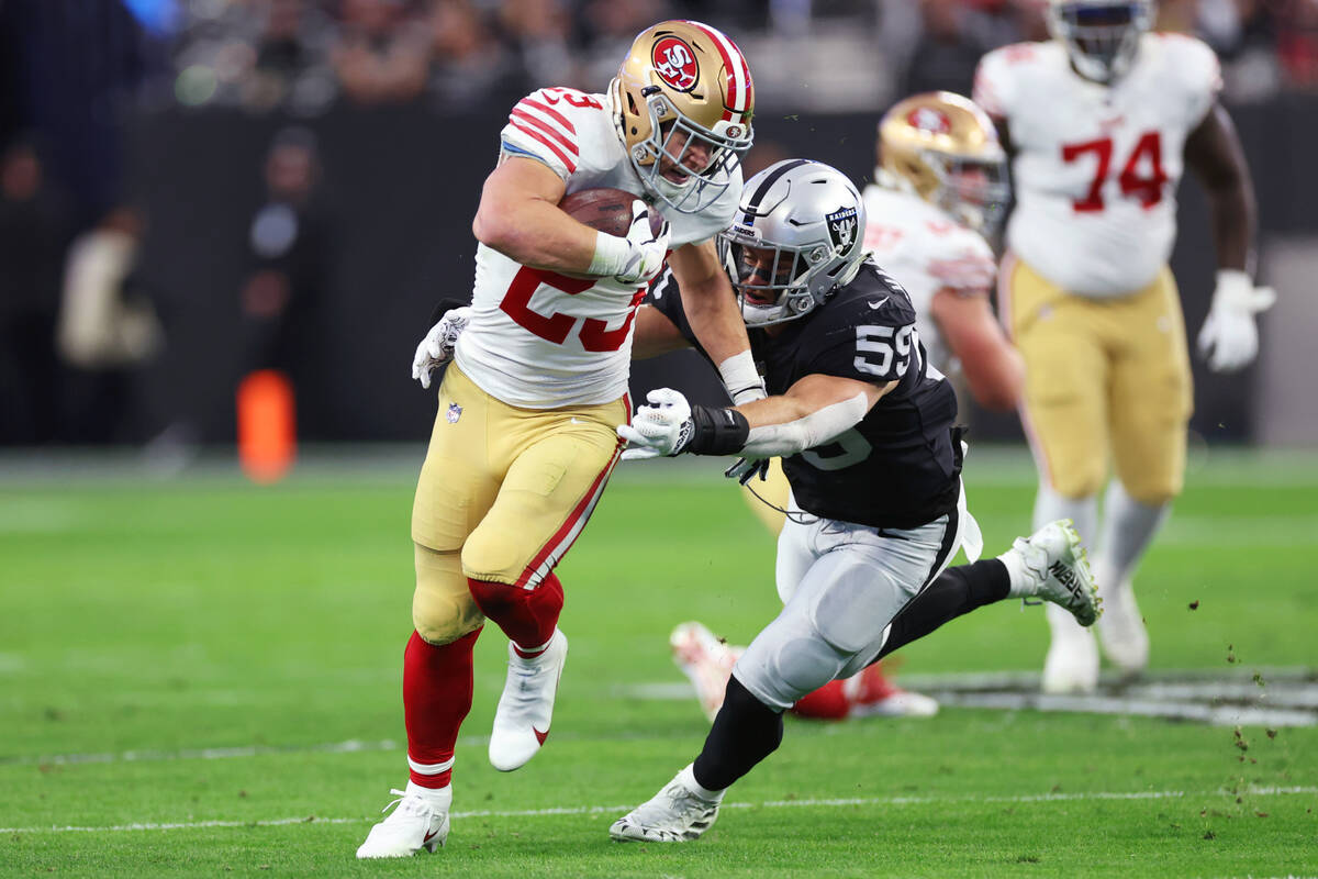 Raiders cornerback Nickell Robey-Coleman (23) gets tackled by Raiders linebacker Luke Masterson ...