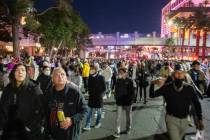 Individuals gather to celebrate New Years Eve on the Las Vegas Strip, Thursday, Dec. 31, 2020. ...