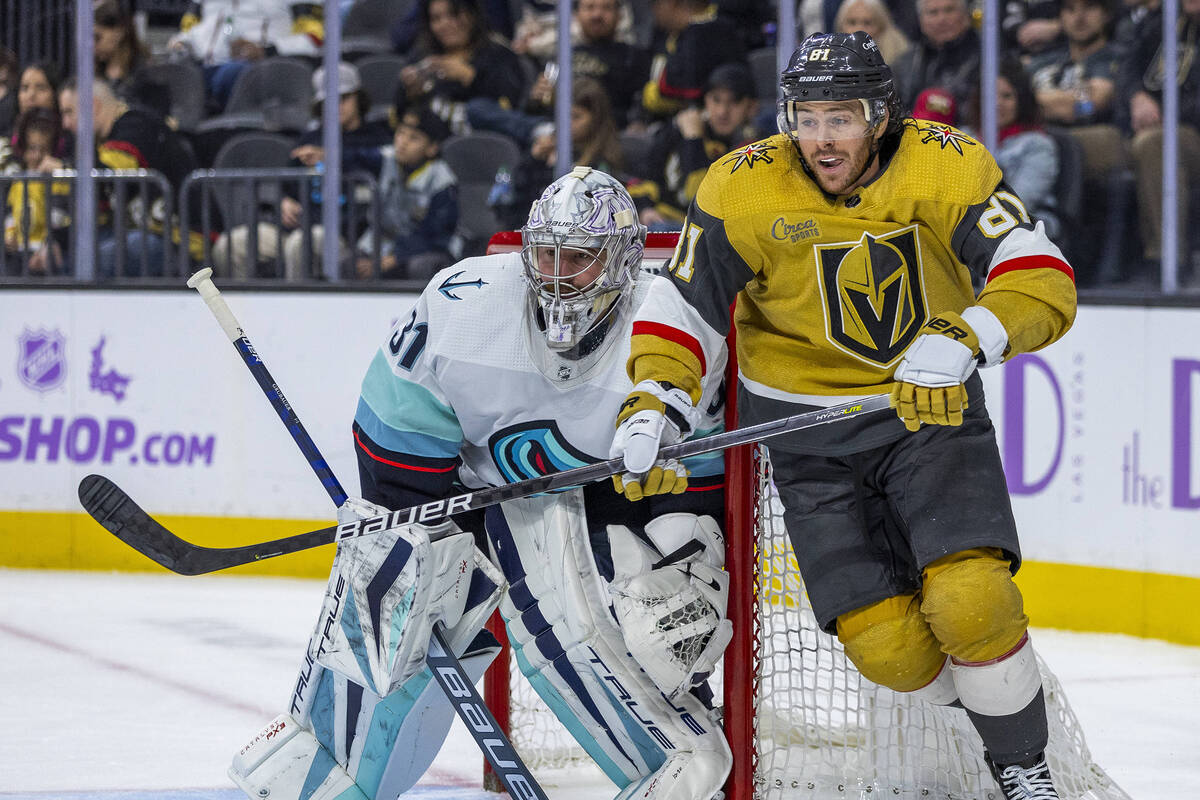 Golden Knights center Jonathan Marchessault (81) reacts to the puck as Seattle Kraken goaltende ...