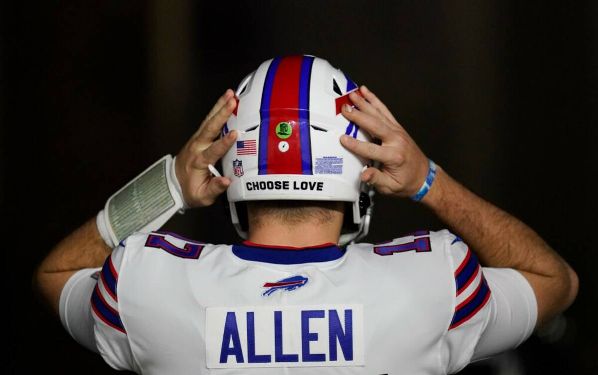 Buffalo Bills quarterback Josh Allen waits to run onto the field for warmups before an NFL foot ...