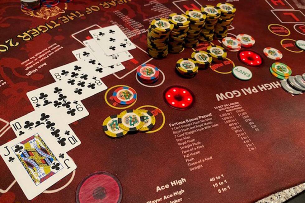 A player at The Cromwell claimed the Ultimate Texas Hold'em major progressive jackpot with a ro ...