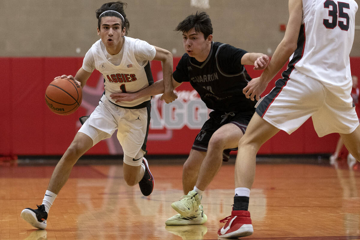 Arbor View’s Maximus Romero (1) drives around Cimarron-Memorial’s David Lynch (14 ...