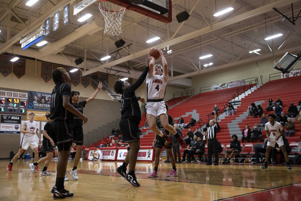 Arbor View’s Jalen Dickel (4) shoots against Cimarron-Memorial’s Gerald Patterson ...