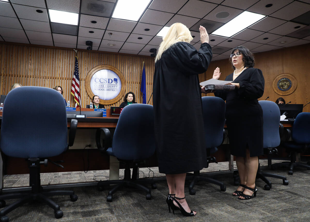 Las Vegas Justice Court Judge Melissa Saragosa swears in Irene Bustamante Adams, newly elected ...