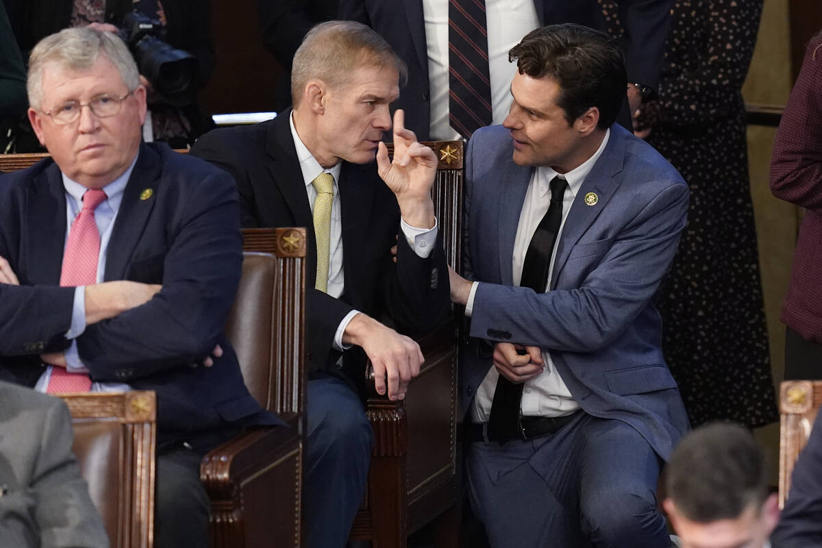 Rep. Matt Gaetz, R-Fla., right, talks with Rep. Jim Jordan, R-Ohio, during a sixth round of vot ...