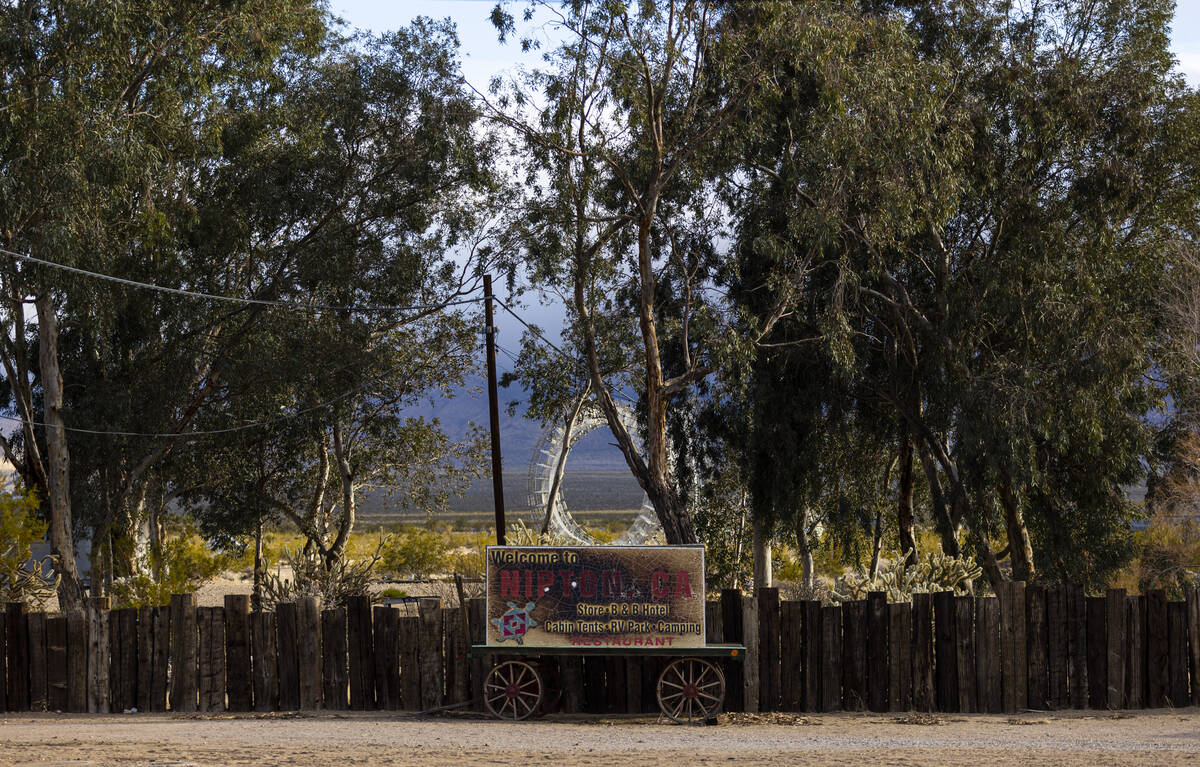 A sign for Nipton, Calif., a small desert town purchased by entertainment company Spiegelworld, ...