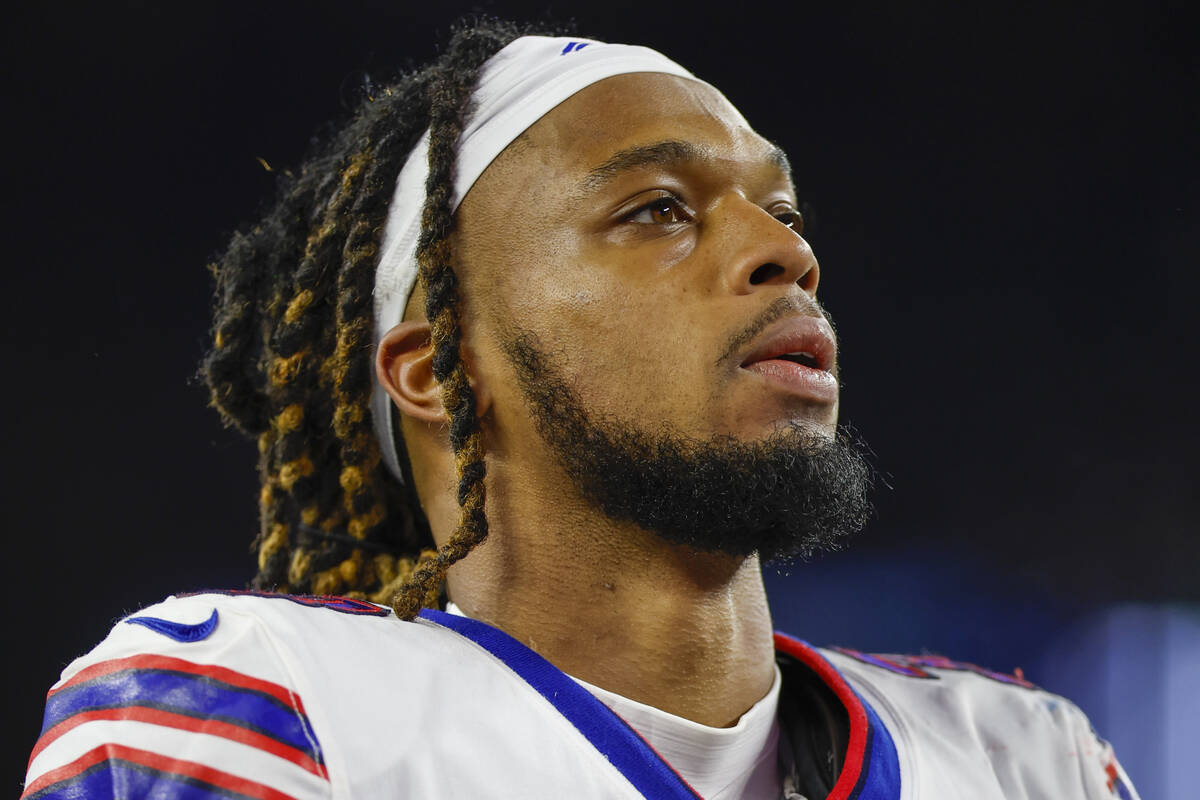 FILE - Buffalo Bills defensive back Damar Hamlin (3) leaves the field after an NFL football gam ...