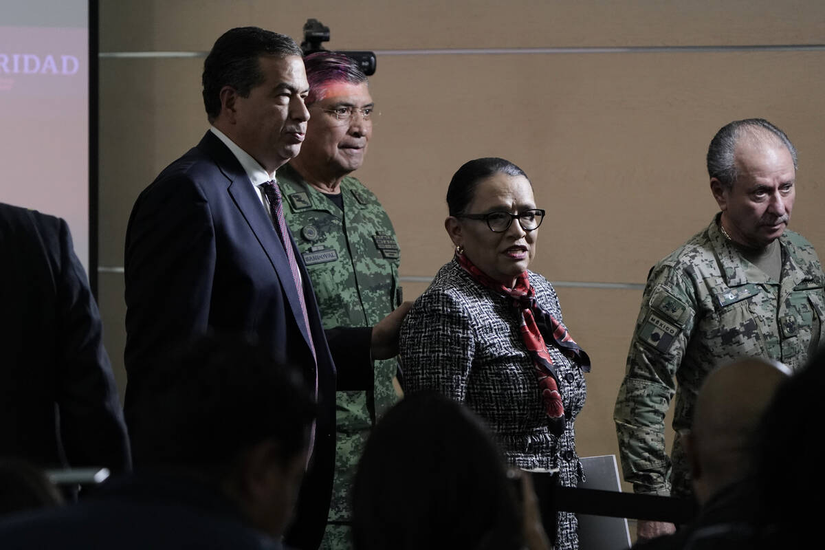 Mexican Public Safety Secretary Rosa Icela Rodriguez, center, and Mexican Defense Secretary Lui ...