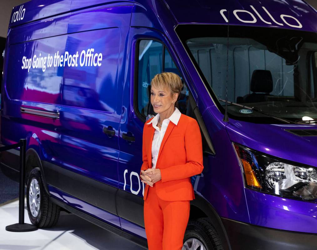 Shark Tank judge Barbara Corcoran poses for a photo at Las Vegas-based Rollo's booth during CES ...