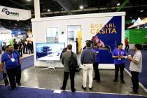 Conventioneers check out the Boxabl foldable casita on opening day of CES at Venetian Expo in L ...