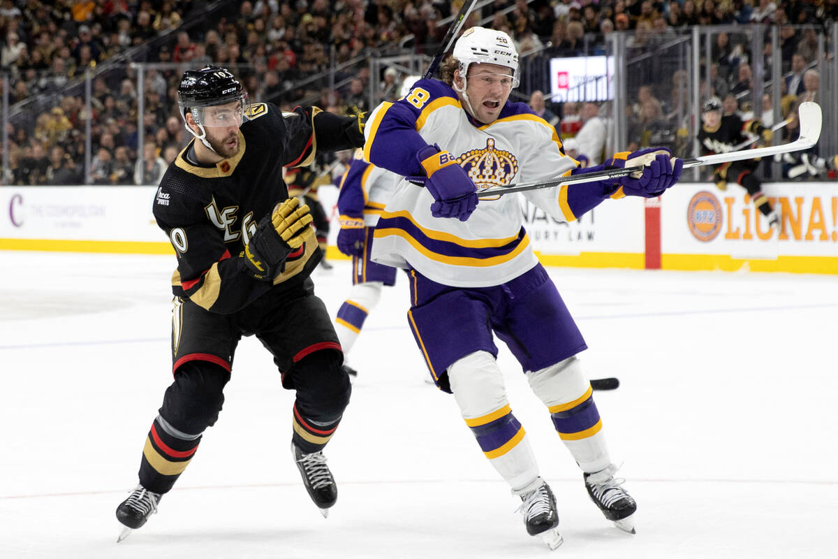 Vegas Golden Knights center Nicolas Roy (10) and Los Angeles Kings left wing Brendan Lemieux (4 ...